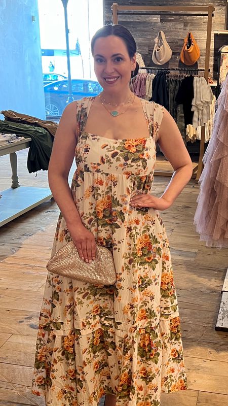 Cute floral summer dress - perfect  to wear to a country concert or a summer wedding. The clutch is big enough to fit your phone and small wallet. 

#LTKFestival #LTKwedding #LTKstyletip