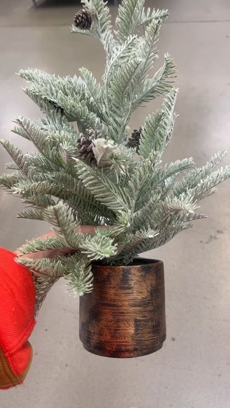 These flocked mini Christmas trees in oil rubbed bronze pots are the perfect addition to your Christmas decor. 

#LTKSeasonal #LTKHoliday