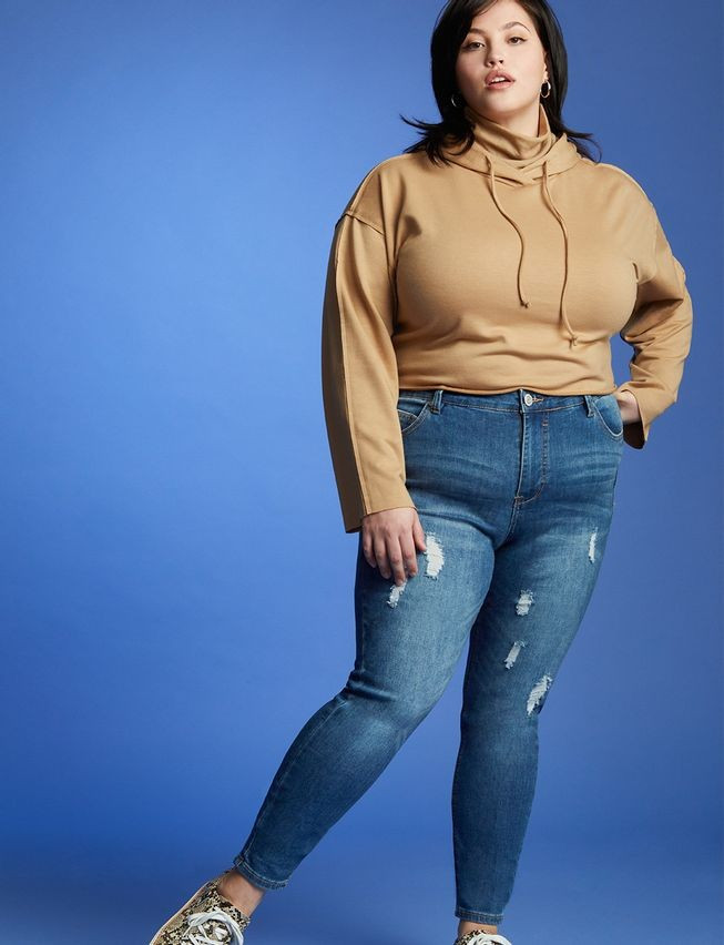 Gena Fit Peach Lift Distressed Skinny Jean - Medium Wash Distressed | Eloquii