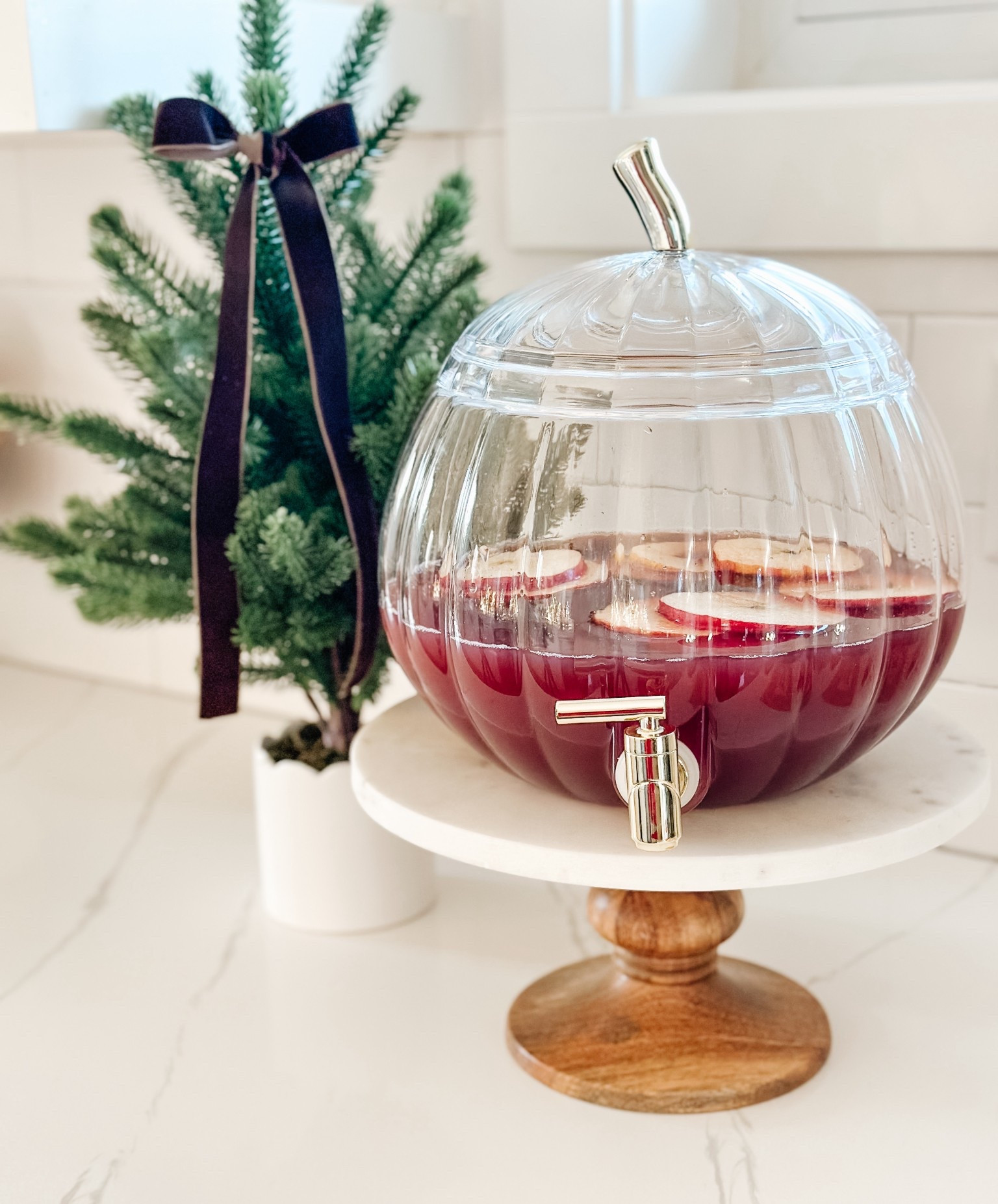 This is FUN way to display your Thanksgiving Sangria! 🍷 
 
Apple Cider, Red Wine, Spiced Rum, Maple Syrup, Sliced Apples + Cinnamon Sticks 


#LTKHoliday #LTKHome #LTKSeasonal
