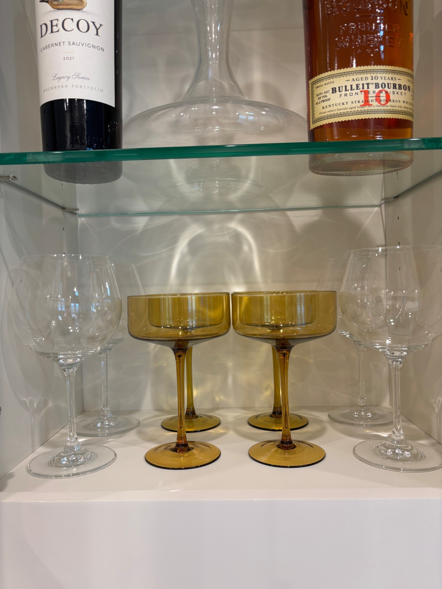 Dressing up our display cabinets with the prettiest glassware from Target! This yellow color is so pretty and adds the pop of color needed to the shelf! 

#LTKSeasonal #LTKHome #LTKSummerEdit