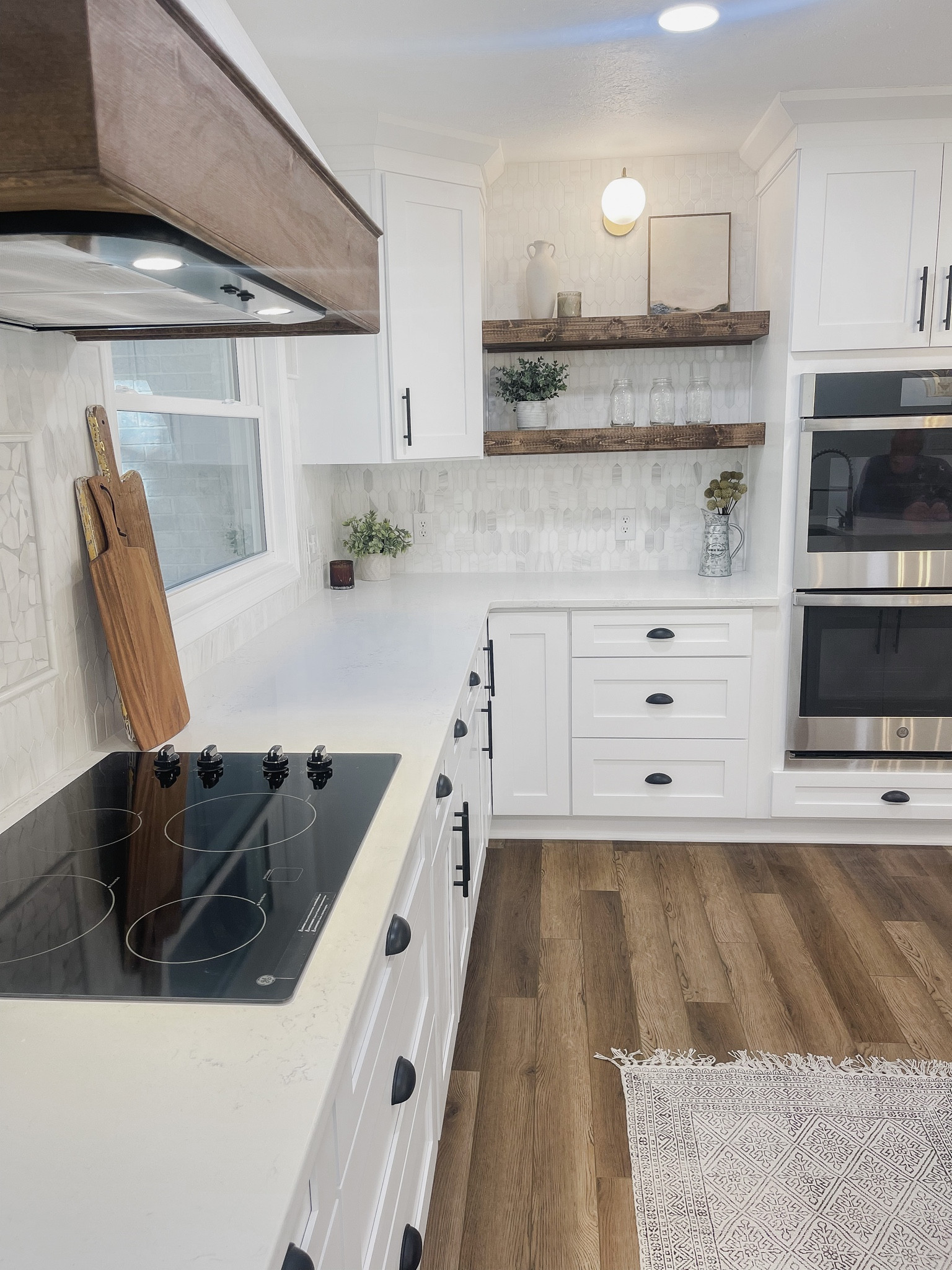 Floating shelves // candle holder // mugs // shelf styling // pottery // vintage artwork // sconce 

#LTKhome #LTKGiftGuide #LTKunder100