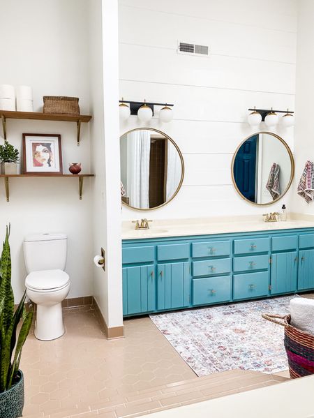 It’s been awhile since I shared this bathroom makeover from our last home! It’s amazing what some paint and fresh decor can do! #bathroom #bathroomdecor #bathroomvanity #homedecor #colorfuldecor #vanitylighting  

#LTKhome