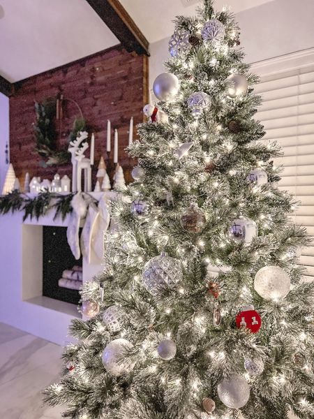 Beautiful 7.5 ft artificial pine Christmas tree with warm LED lights. 

#LTKHoliday #LTKSeasonal #LTKhome