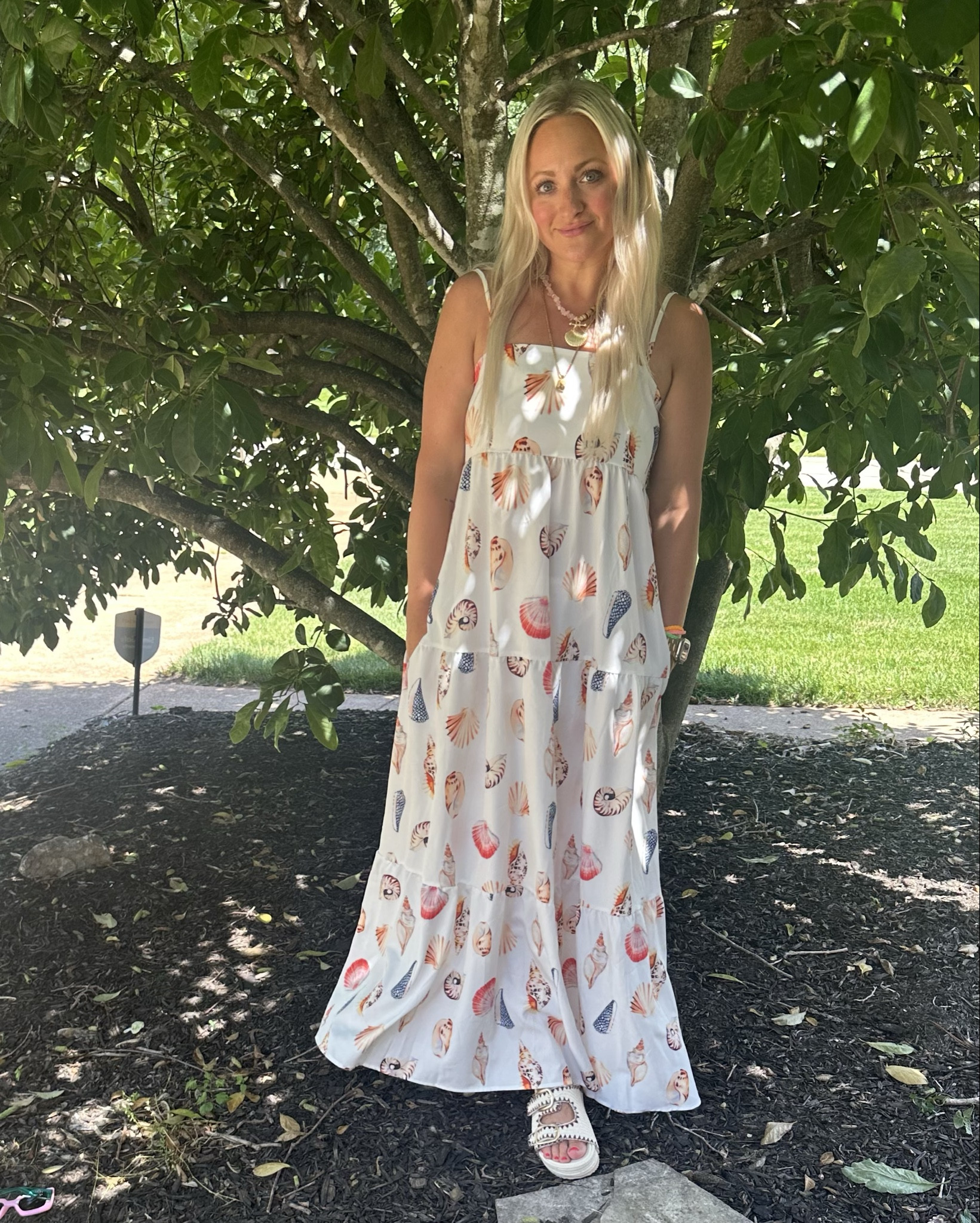 Seashells are my FAVORITE! This maxi has pockets, a stretchy back, and adjustable straps!!! Easy throw on dress for a casual beach or pool day or dress up for dinner/HH! The sandals are also my fav staple for this summer, and these are lightweight and SO COMFY. Both items are TTS! I’m in a medium dress and 7.5 sandal.  
#amazonfinds #amazon 

#LTKStyleTip #LTKSummerEdit #LTKFindsUnder50