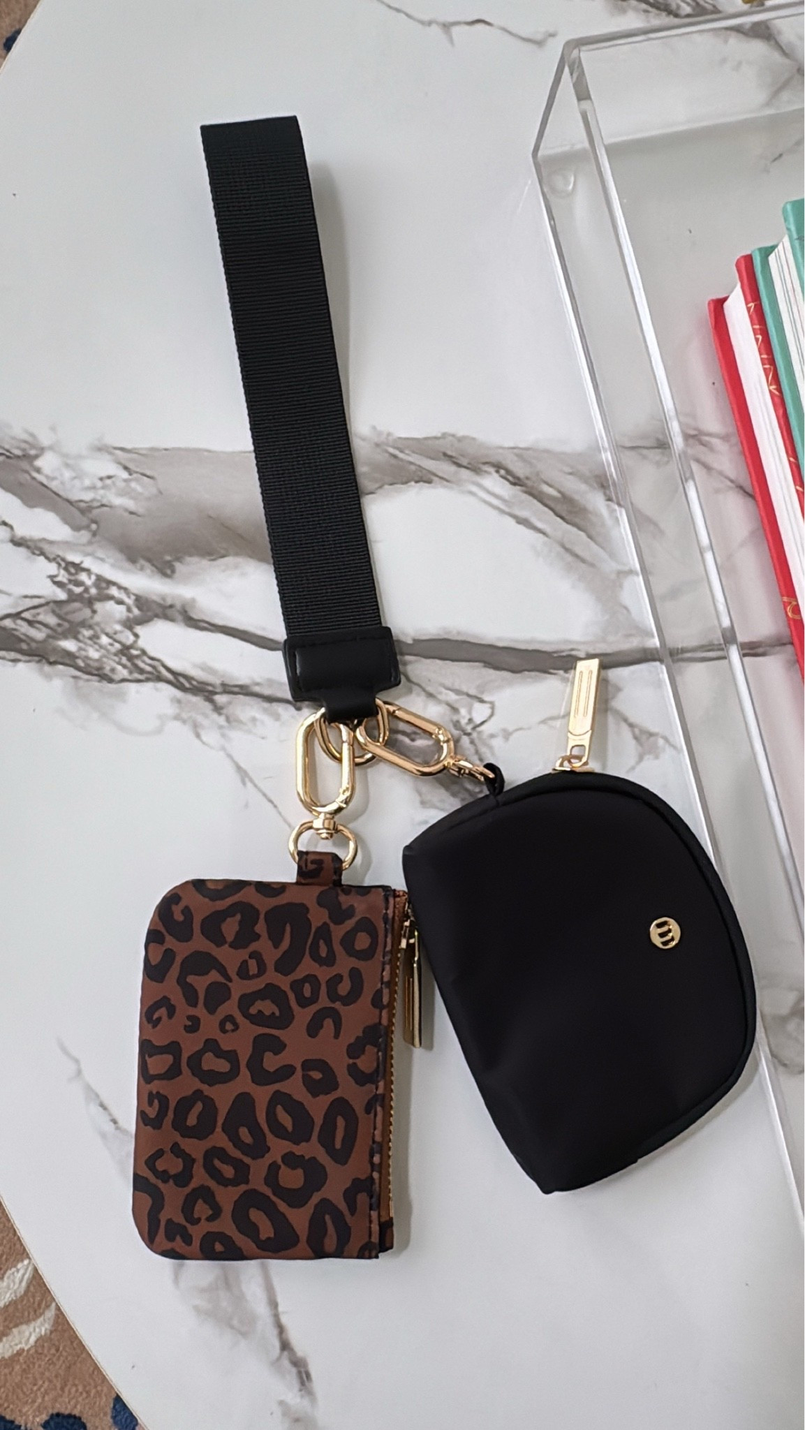 The cutest little hands free bag for busy days 🖤 I love the wrist strap with the leopard wallet and matching pouch attached, so your essentials stay together without carrying a full bag. Such a fun mix of practical and cute!

wristlet bag, leopard wallet, hands free bag, small crossbody alternative, everyday accessories, leopard accessories, fall accessories, wallet pouch, travel accessories, everyday bag, lovelylifestyling

#LTKTravel #LTKdayinmylife #LTKootd