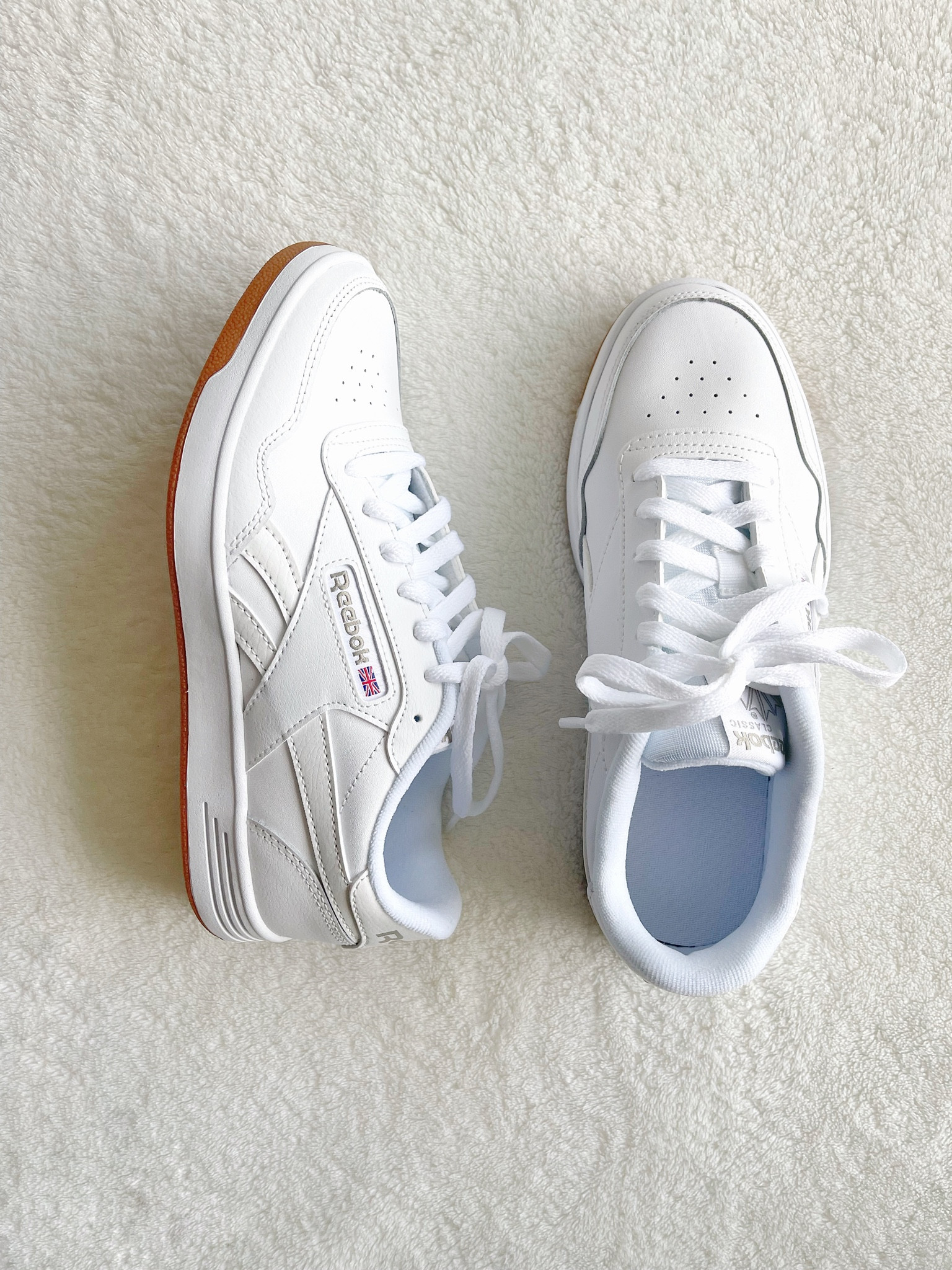 White sneakers. So comfy and can be worn with trousers, shorts, jeans, dresses and more! Runs tts  

#LTKshoecrush #LTKunder100 #LTKFitness