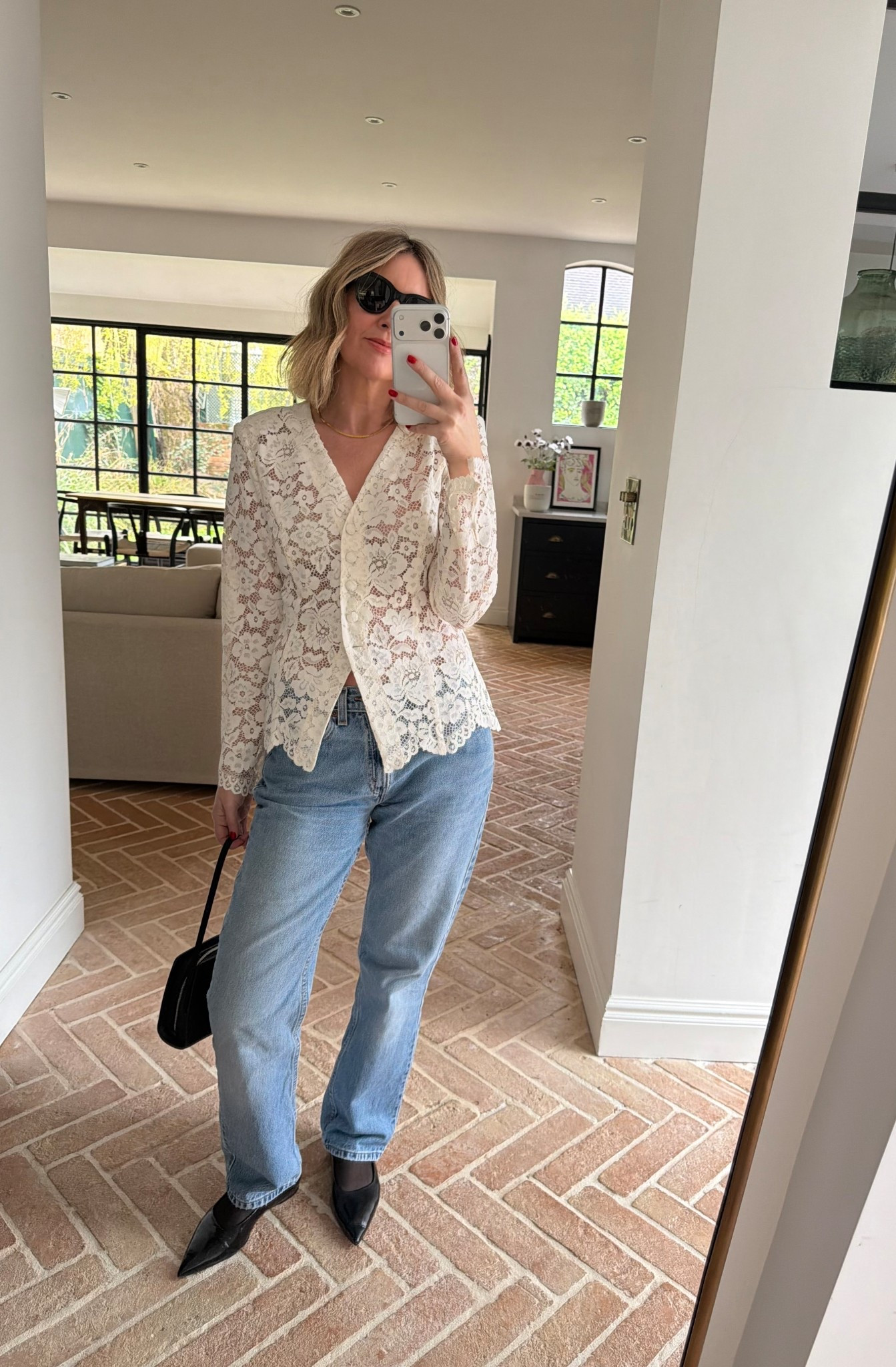 Lace top + vintage jeans + patent shoes 

#LTKpartywear #LTKstyletip #LTKspring