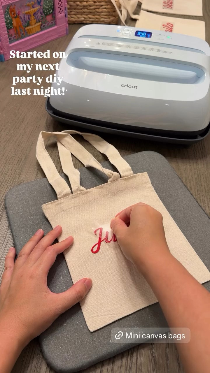 Mini canvas bags! Started on my next party diy last night!

Tote bags, Cricut easypress, Cricut machine, smart iron on, gingham ribbon

#LTKsummer #LTKhome