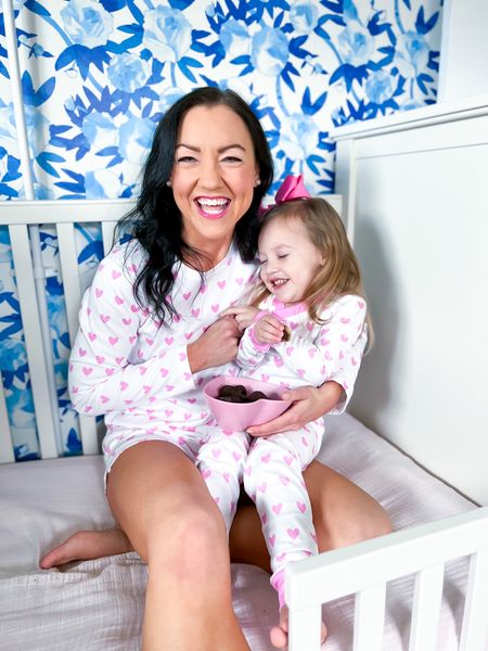 Valentine’s Day pajamas for the whole family! These adorable pink heart pajamas from LAKE are also available in blue hearts and red kisses. They come in sizes baby-adults and are the softest Pima cotton pjs. Mommy and me, matching mom, pink, valentines clothing. Perfect for vday! #valentinesday #valentines #valentinesoutfit #mommyandme #matchingmom 

#LTKunder100 #LTKfamily #LTKGiftGuide