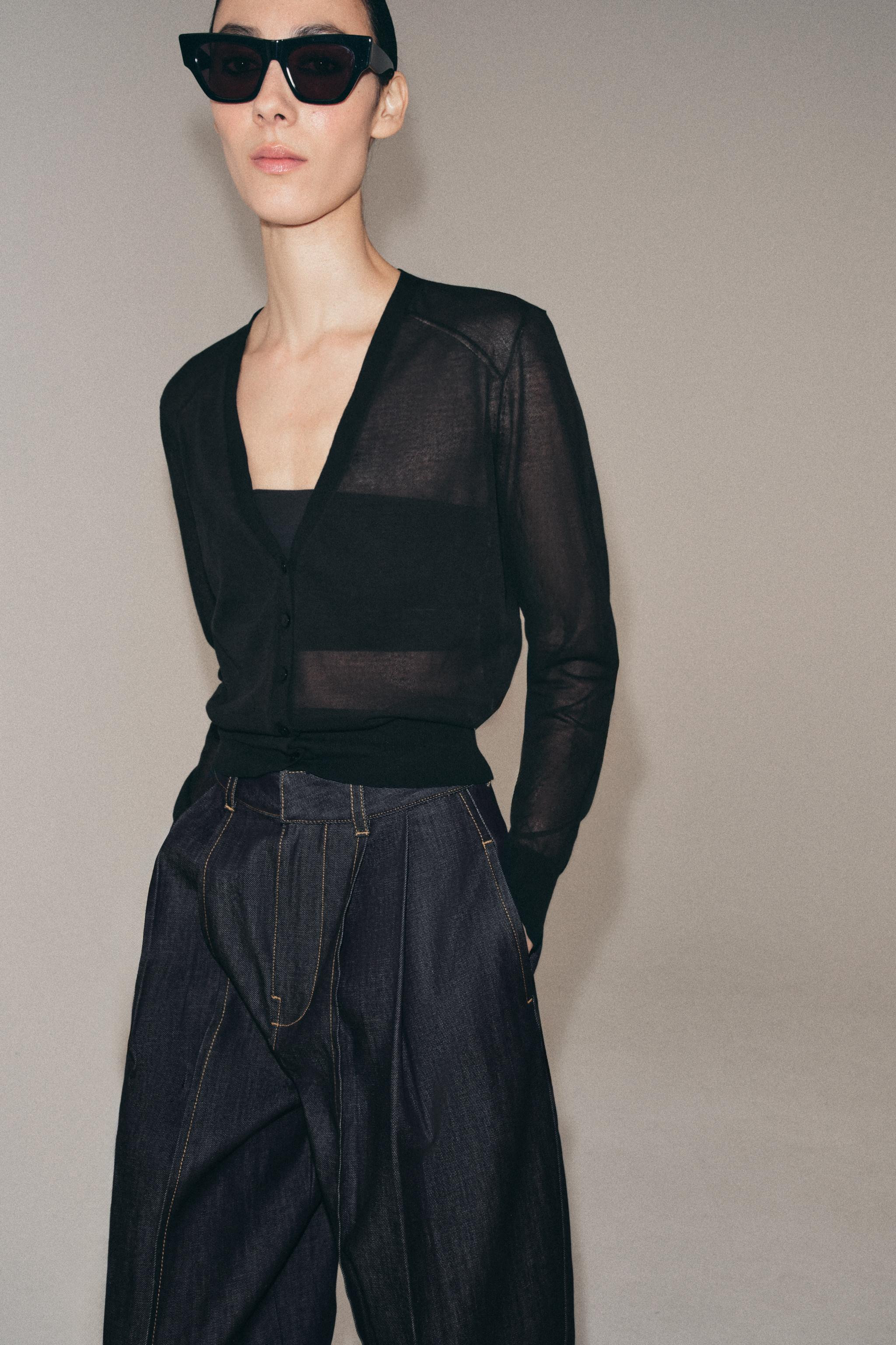 Cardigan crafted from semi-sheer knit. V-neck and long sleeves. Front button closure. | Zara US
