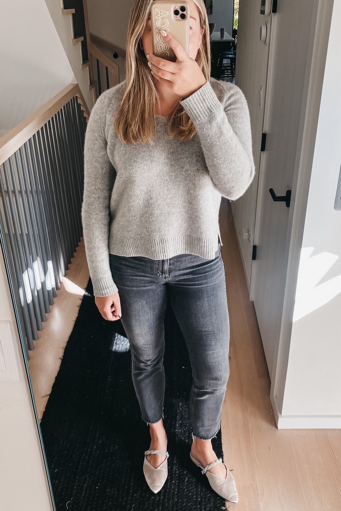 Cashmere v-neck sweater is old from Vineyard Vines. Jeans run TTS. I would size up a 1/2 size in these slipper flats! And use code HURRY for 20% off this custom phone case. 