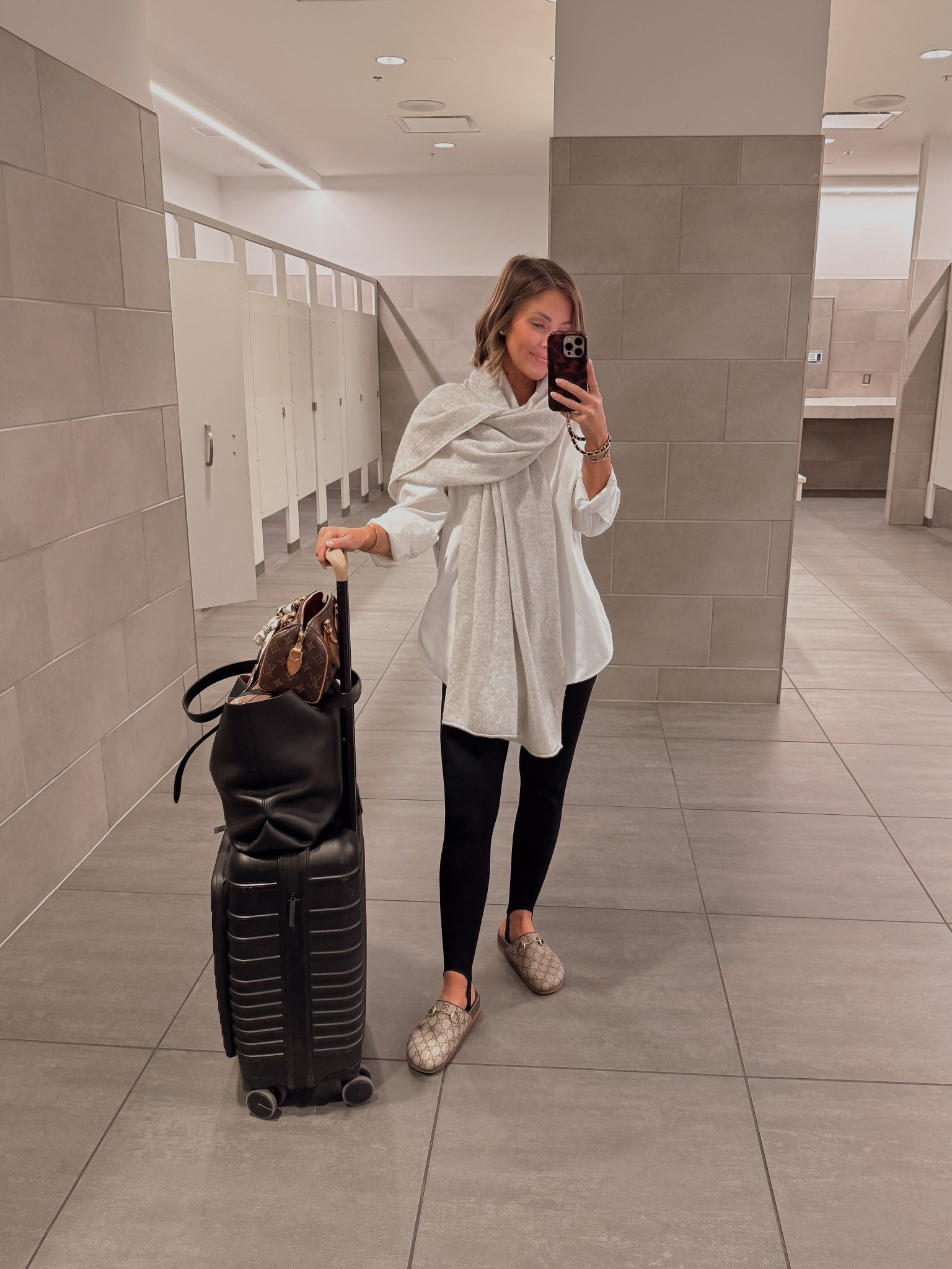 Airport fit check ✈️ XS wrinkle resistant button down / XS stirrup leggings

#LTKootd #LTKPetite #LTKTravel