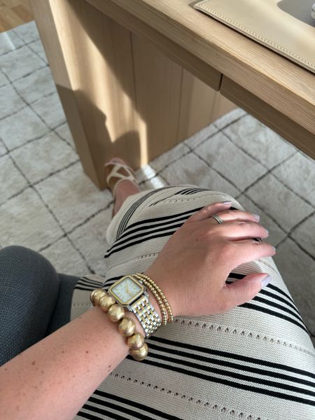 My new favorite watch! Love the mix of gold and silver together. Perfect to pair with any jewelry you may be wearing. 

Watch, gift idea, arm candy, jewelry, dress, sandals, rug, vacation outfit, dress, 

#LTKFindsUnder100 #LTKWedding #LTKGiftGuide