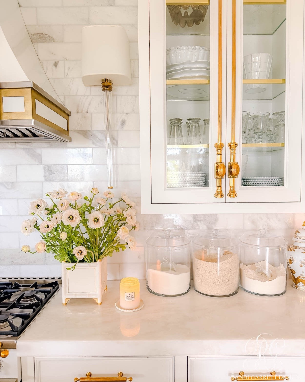 The prettiest faux ranunculus for spring! I used 8 stems in my white and gold bamboo cache pot. 

#LTKSeasonal #LTKHome