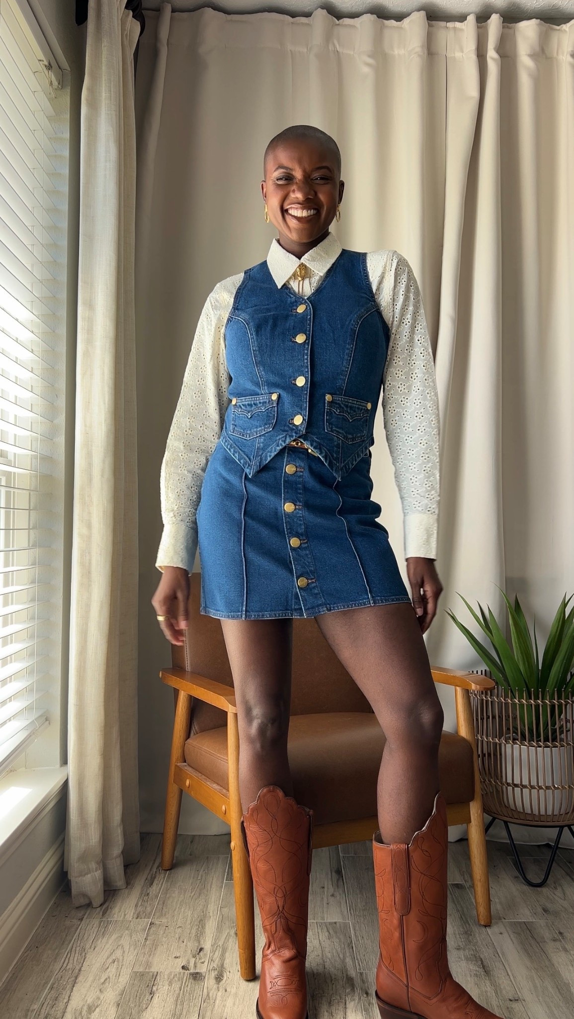 Western outfit for Rodeo season! Denim wrangler vest and skirt with gold buttons, brown western boots, vintage white button up shirt with eyelets and vintage gold earrings  

#LTKdayinmylife