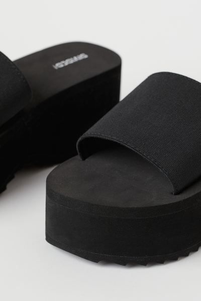 Platform pool shoes with a wide elasticized foot strap and fluted soles. Front platform height 1 ... | H&M (US + CA)