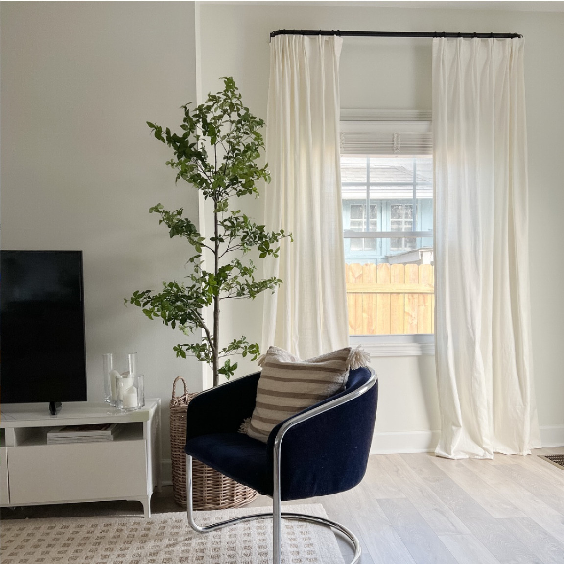 Love my new faux tree in the living room!!

#LTKhome