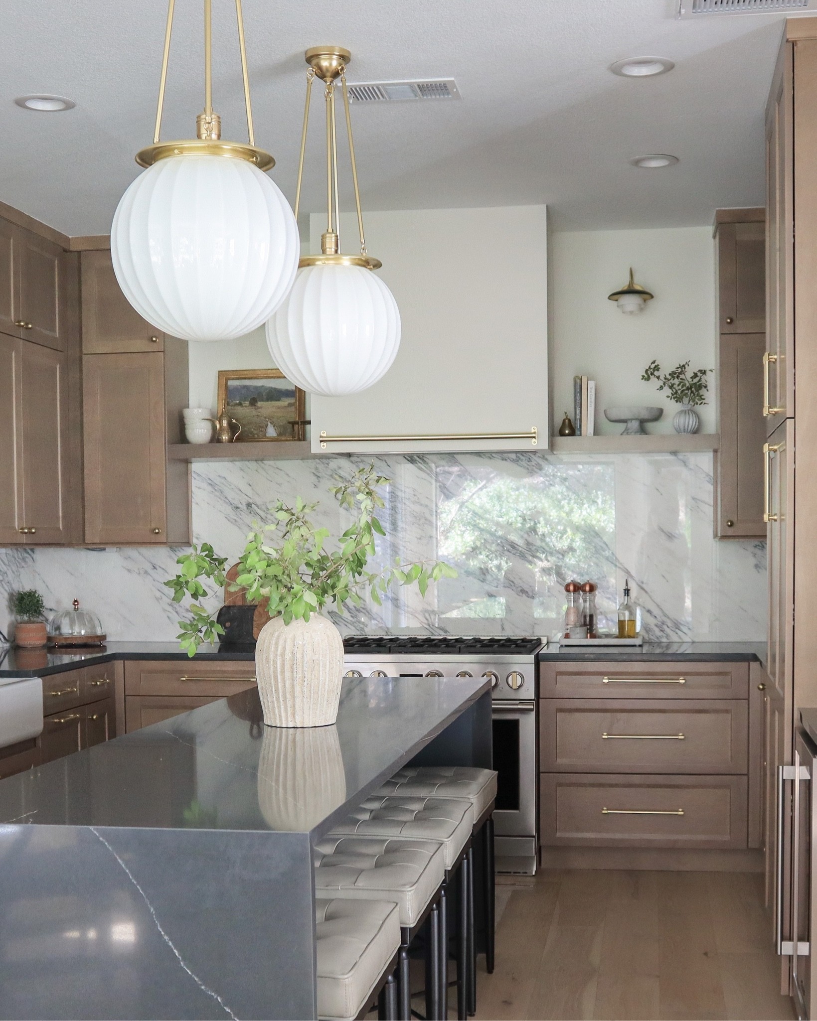 Fluted globe kitchen pendants, aged brass cabinet hardware, sconce, pot rail, kitchen countertop accessories and decor

#LTKunder50 #LTKstyletip #LTKhome