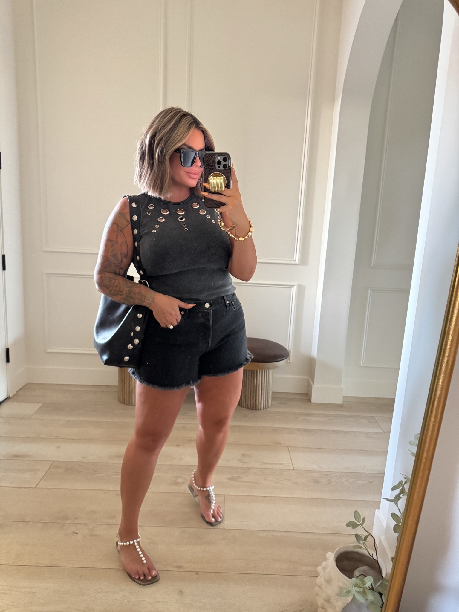 Tank L 
Shorts size up 2 sizes for relaxed fit I’m usually a 31 I did a 33 and they are perfection.