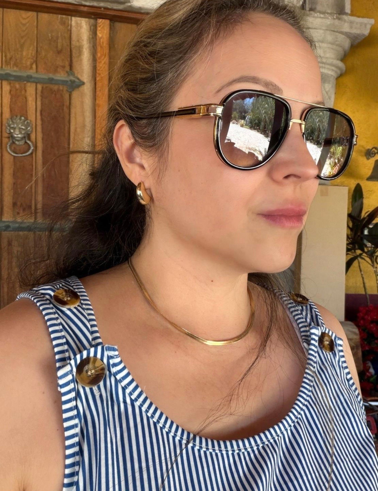 A sleek gold herringbone chain necklace and matching gold hoop earrings.Eyewear: Classic aviator-style sunglasses with dark lenses and gold frames.

#LTKootd #LTKgrwm #LTKdayinmylife