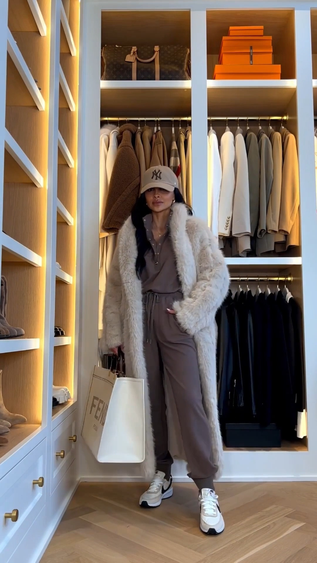 Winter outfit ideas
Saks jumpsuit
Faux fur coat linking similar
Nike sneakers on sale 

#LTKFindsUnder100 #LTKSaleAlert #LTKTravel