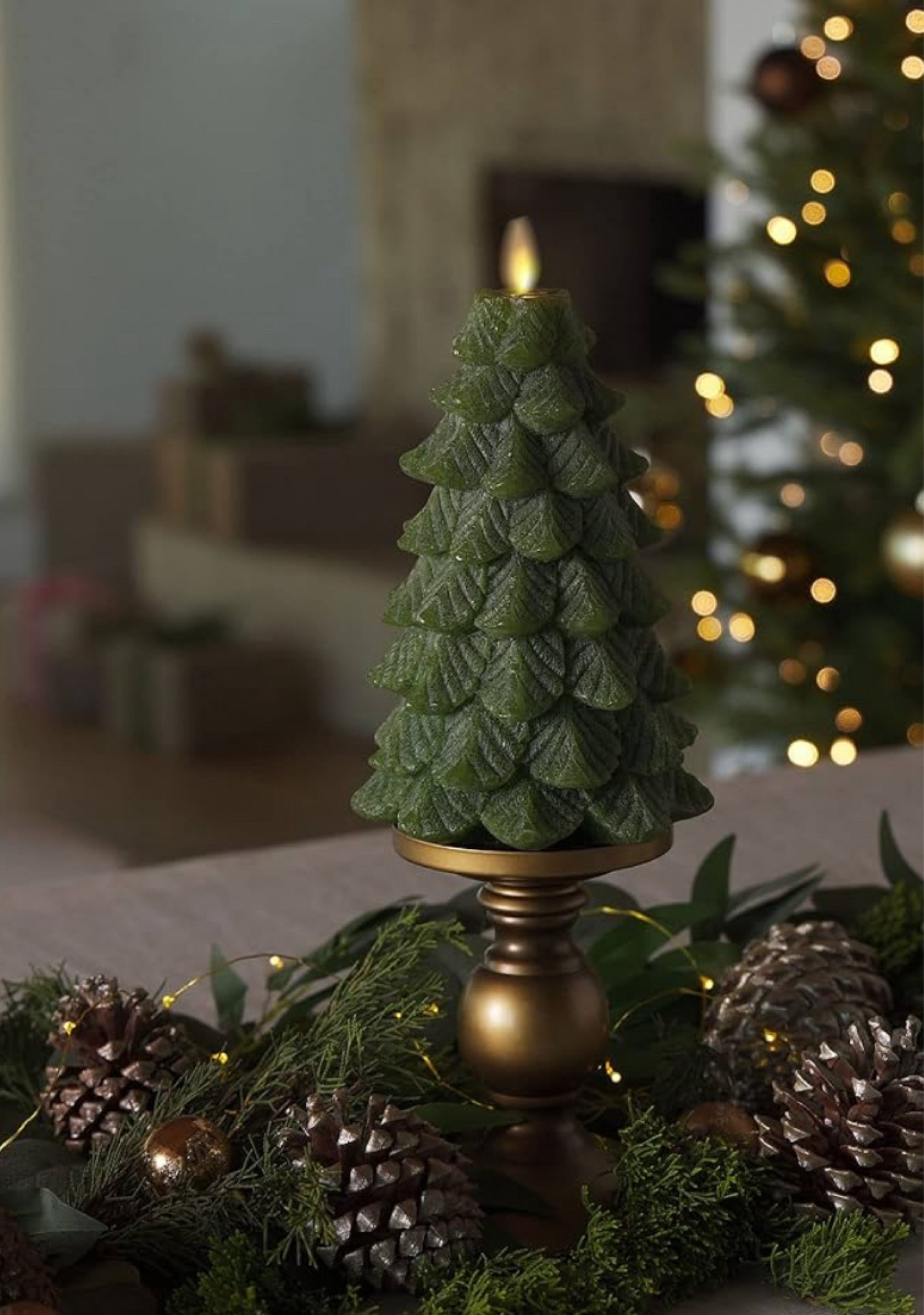 Christmas tree flame less candle, Christmas decor 

#LTKHome #LTKHoliday #LTKGiftGuide