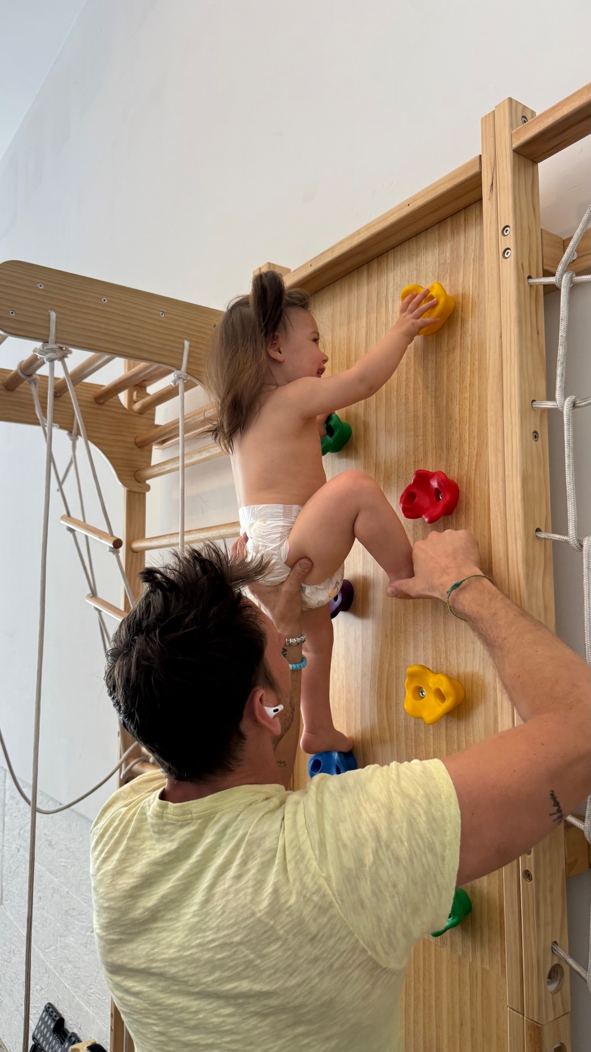 My one year old toddler climbing our wall gym 

#LTKBaby #LTKHome #LTKKids