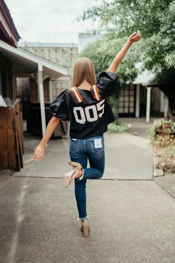 Queen of Sparkles - Orange & Black Jersey Peplum Top | Pink Creek