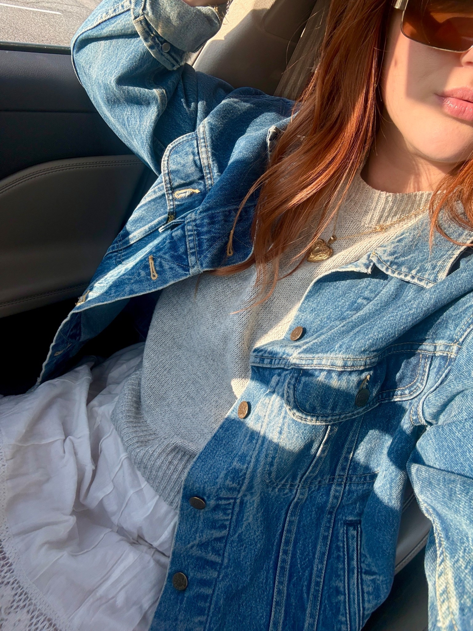 Easy everyday outfit featuring a classic denim jacket layered over a cozy sweater and feminine skirt. This timeless casual outfit works for errands, brunch, or everyday style while still feeling put together and comfortable.

#LTKmomlife #LTKootd #LTKSpringSale