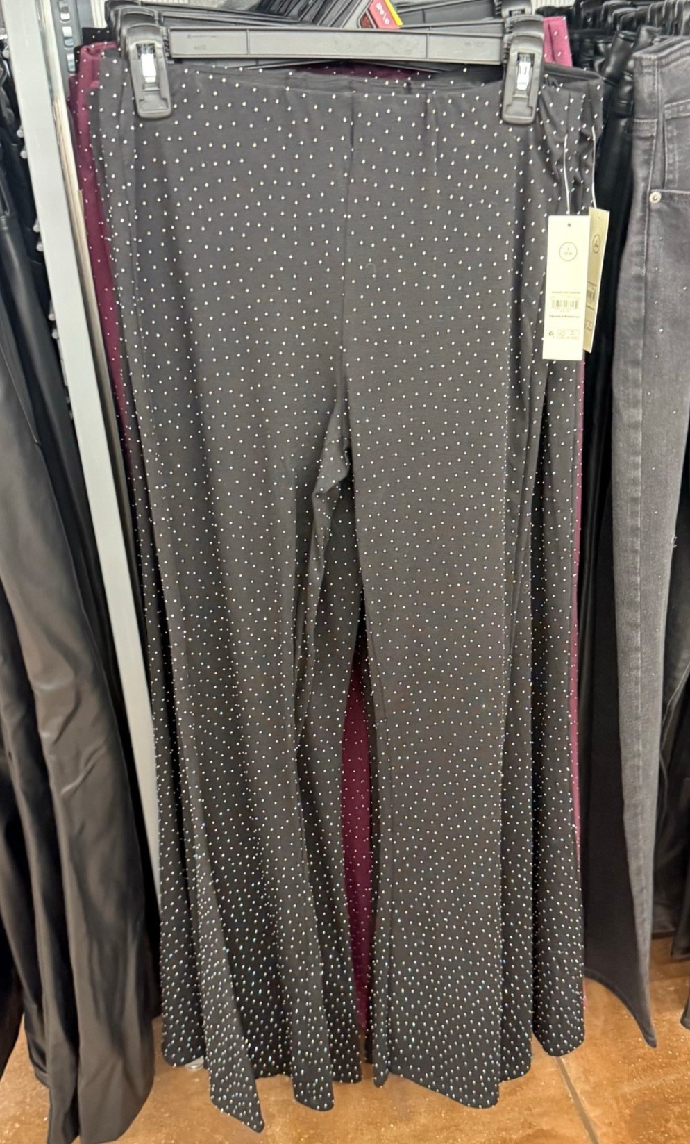Black Faux Rhinestone Studded Ribbed Flare Pants, new years outfit 
These rhinestone studded ribbed flare pants add a fun, dressy touch to any outfit. Perfect for holiday parties, nights out, and statement looks, they’re comfortable while still feeling bold and festive.

#LTKPlusSize #LTKFindsUnder50 #LTKMidsize