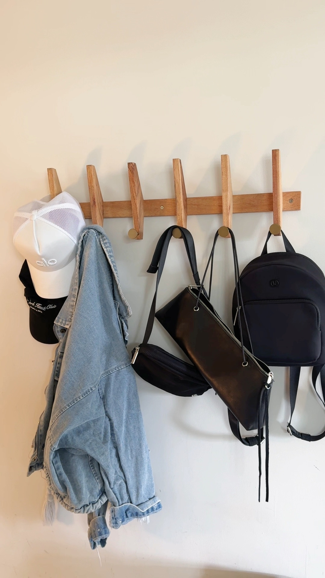 Making the most out of small spaces in my apartment! The perfect coatrack/wall hooks to hang everything when we walk in! #entryway #apartmentdecor #homedecor 

#LTKHome