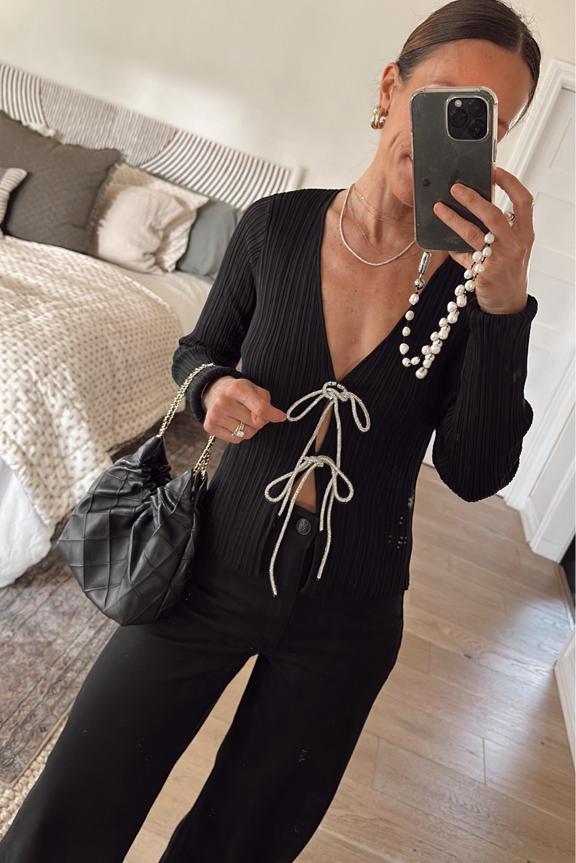 Holiday look with jeans 
Embellished bow tie top is so fun and runs tts 

#LTKOver40