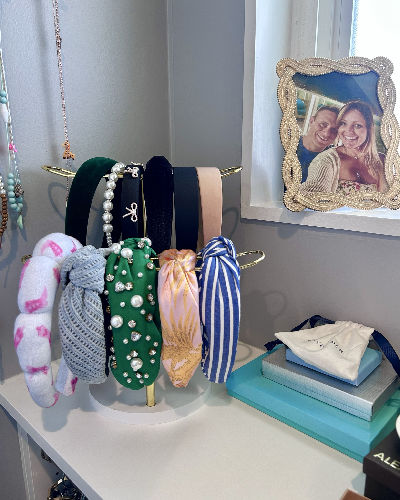 Are headbands still in, or is it just me? Either way—they look cute on my head and even cuter on this gold + white two-tier holder. Bonus: it matches my necklace stand and the little gold pup who keeps my rings safe. A vibe!

#LTKGiftGuide #LTKHome #LTKFindsUnder50