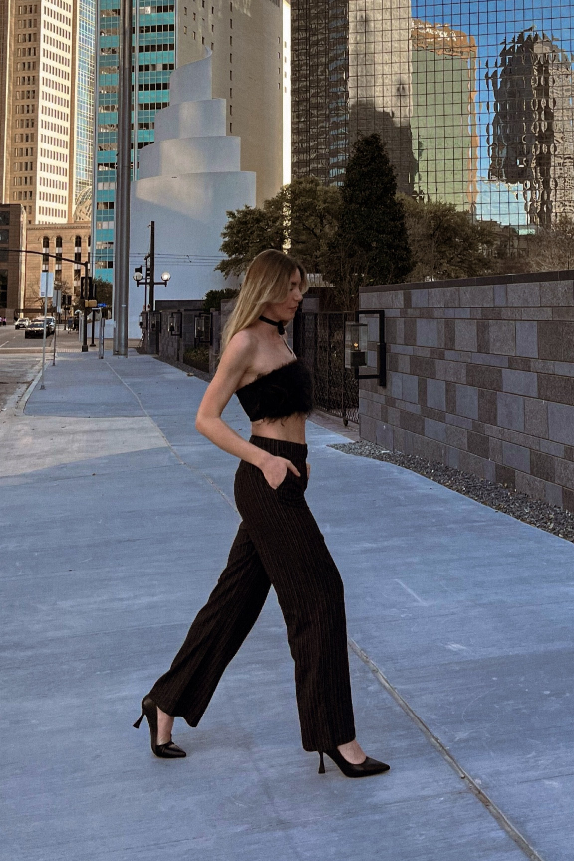 all black city vibes outfit, pinstripe trousers, kitten heels, feather bandeau top, bow choker necklace, crop top, it style 

#LTKfindsunder100 #LTKU #LTKstyletip