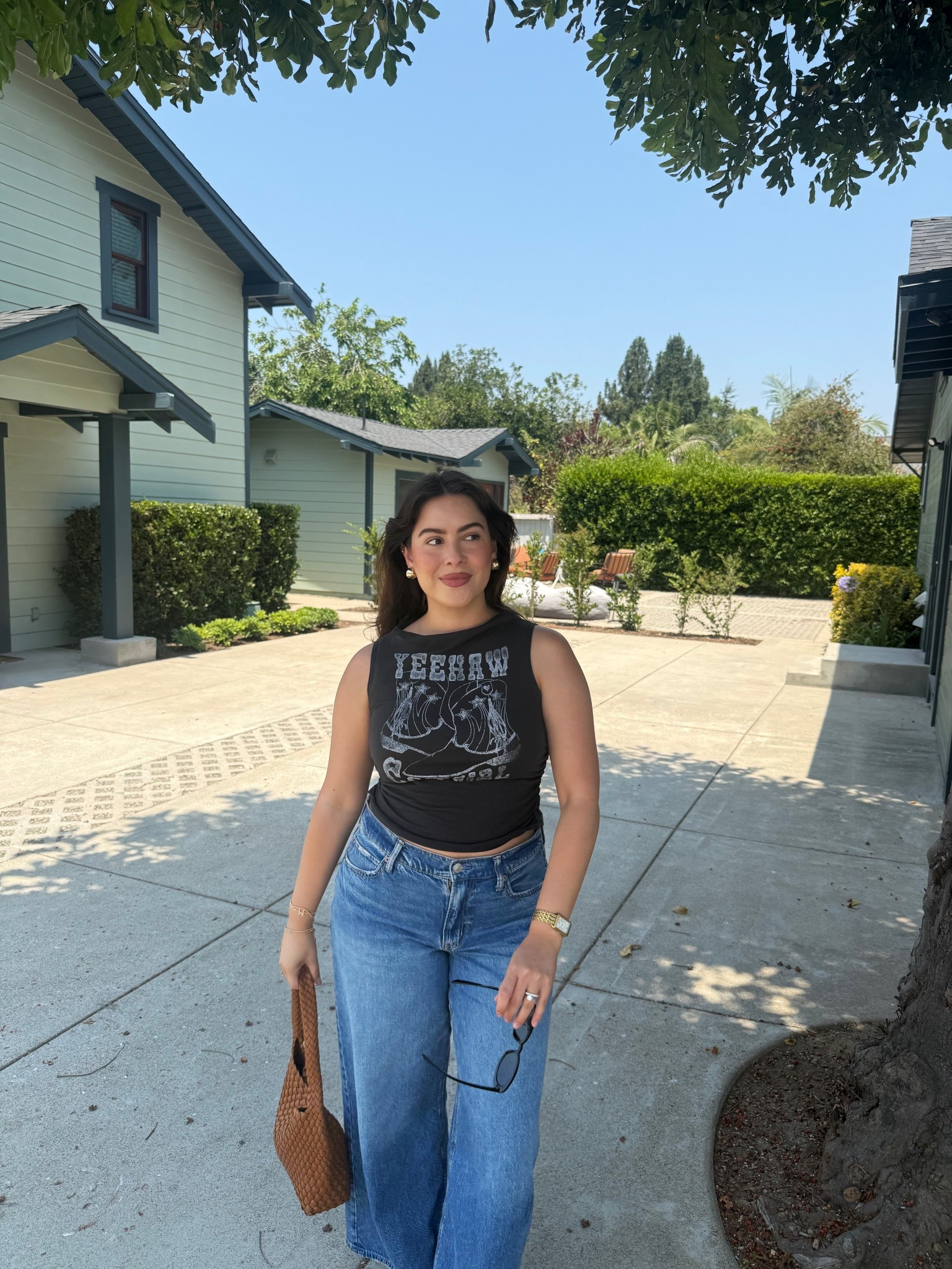 Cool graphic tank & AE wide leg jeans 

#LTKStyleTip #LTKSeasonal #LTKPetite