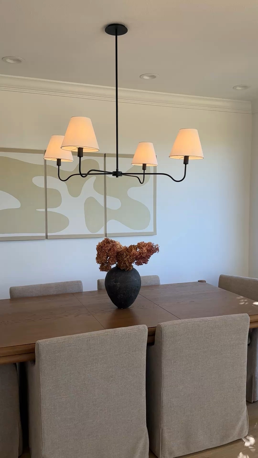 Added this dining room light and it looks sooo good. Love that I can swap the shades for a different look if I get bored!

#LTKHome