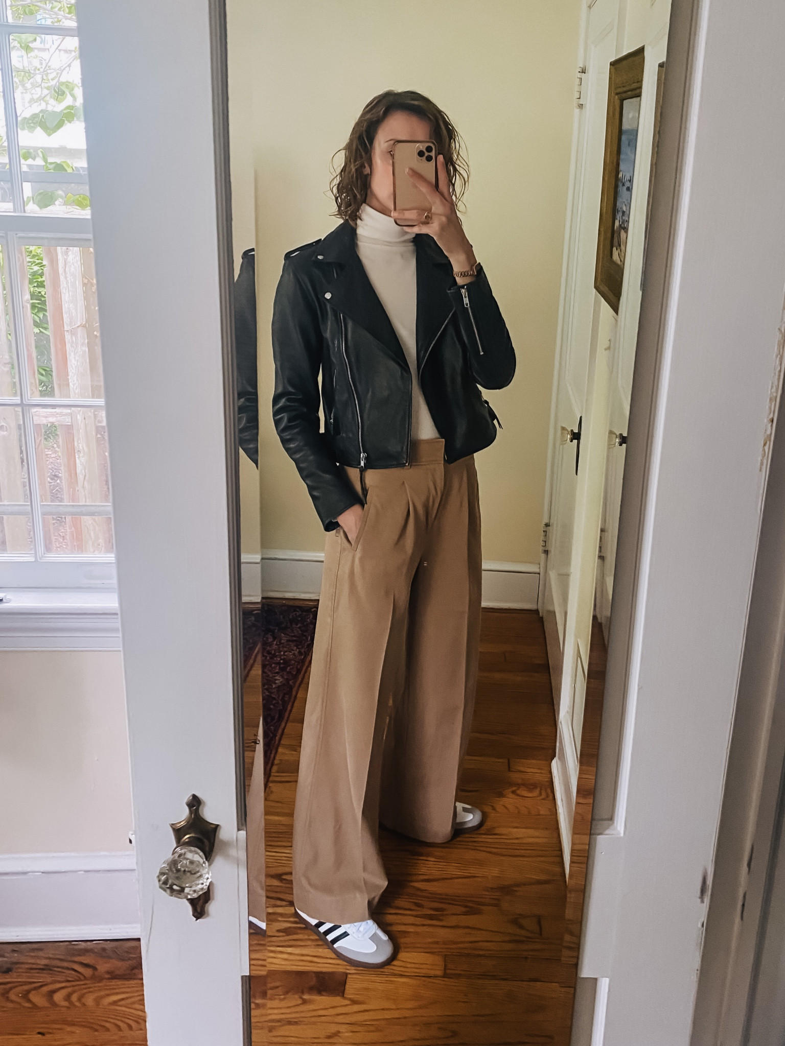 Commuter-friendly office outfit! Love this leather jacket with khaki pants and adidas! 

#LTKstyletip #LTKshoecrush #LTKworkwear