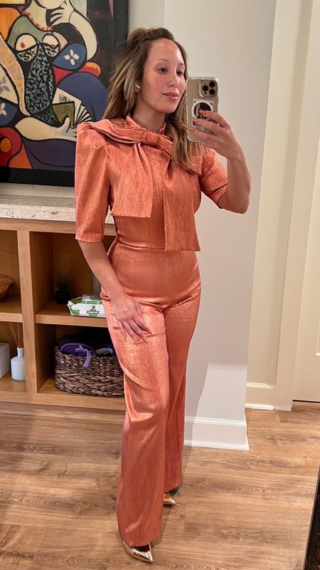 Such a perfect holiday jumpsuit by Black Halo! Loving the color and the structured look! Comment below and let me know your thoughts! 

#LTKSeasonal #LTKHoliday #LTKparties