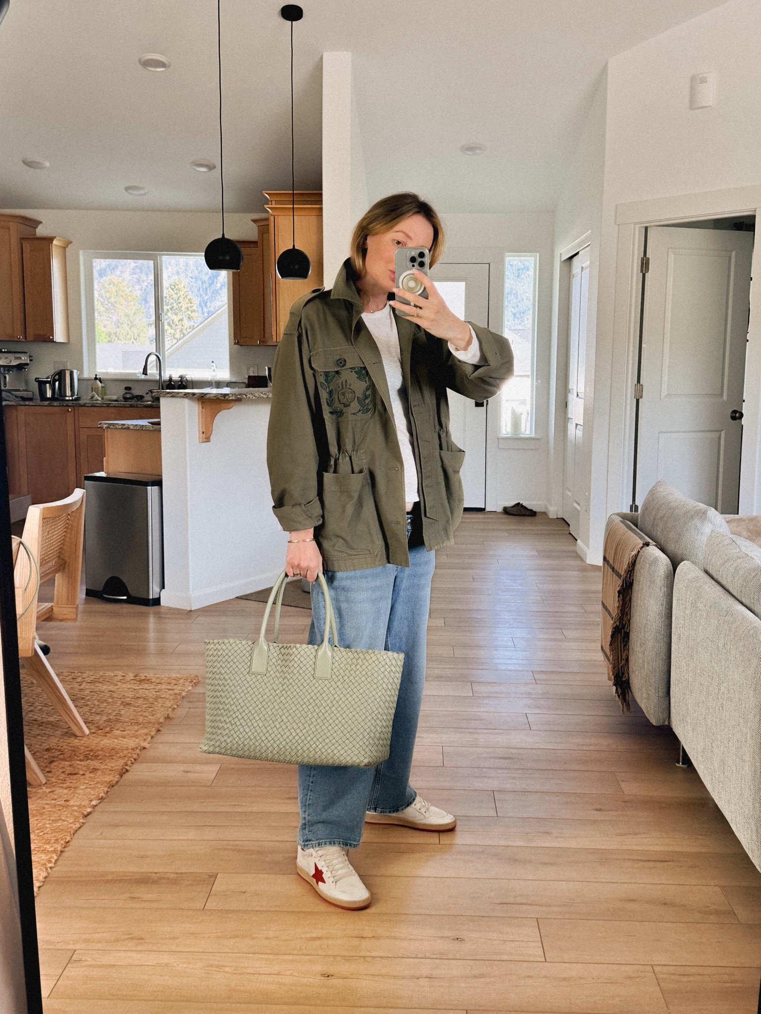 OOTD: Golden goose ball star sneakers + H&M maternity jeans + Zadig & -Voltaire utility jacket (similar style by Madewell and mango) + James Perse t-shirt (on sale right now!). 
Bag: Bottega Veneta Cabat in travertine (similar style available from Etsy)

#LTKSeasonal #LTKFindsUnder100 #LTKSaleAlert
