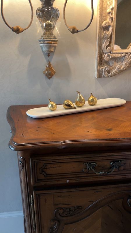 Couldn’t resist these golden figs to style the console in my foyer. 
#justjeannie #homedecor #homeinteriordesign #foyertabledecor #foyerdecor


#LTKhome #LTKfindsunder50