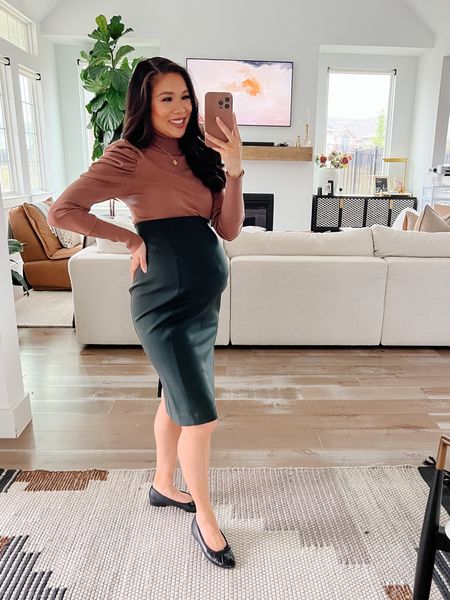 Workwear outfit that’s maternity friendly. Love this puff sleeve sweater and super stretchy scuba skirt. Code HKCUNG20 gets you 20% off at MMLaFleur. I sized up to a 2 in the skirt to accommodate the bump. This would be great for business casual. 

#LTKstyletip #LTKworkwear #LTKbump