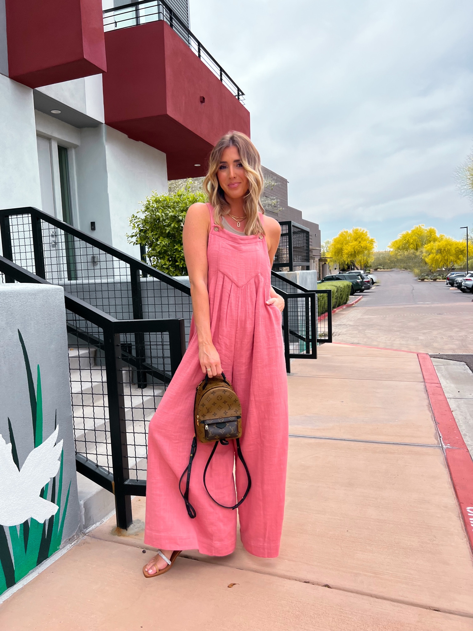 This is such a comfy and cute jumpsuit!! I’m wearing my true size XS, go with your normal size. My cami is an Amazon find and my sandals run tts. Bag is now you glow LV

#LTKstyletip #LTKshoecrush #LTKunder100