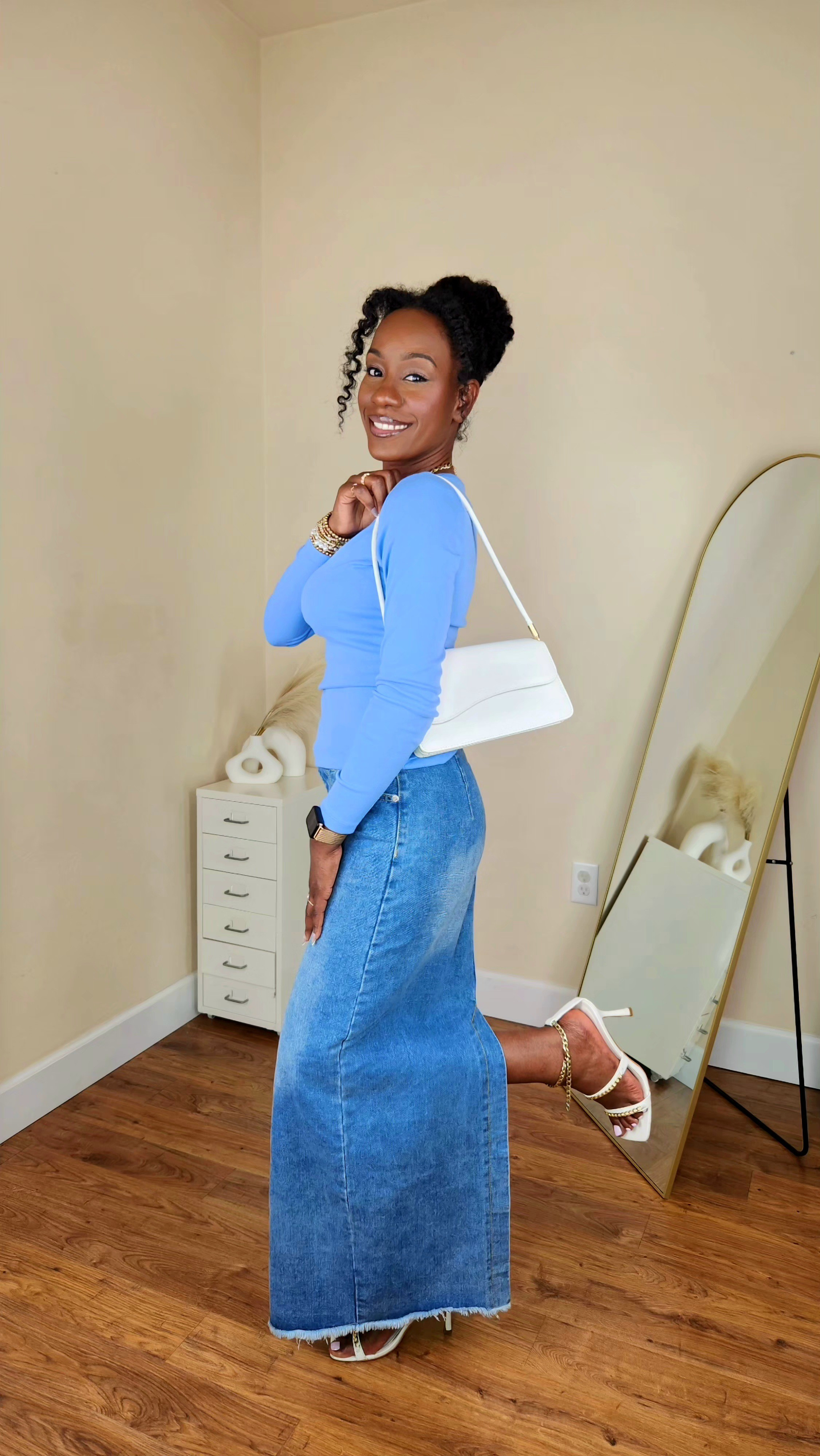 I've been loving this shade of blue lately and this long sleeve top is so comfy and the boatneck detail gives this long-sleeved basic top a little character. The mid blue denim skirt is not too light and not too dark. Perfect color for transitioning into spring. Paired with a white bag and white heels to complete the look. 

#LTKootd #LTKgrwm #LTKSaleAlert