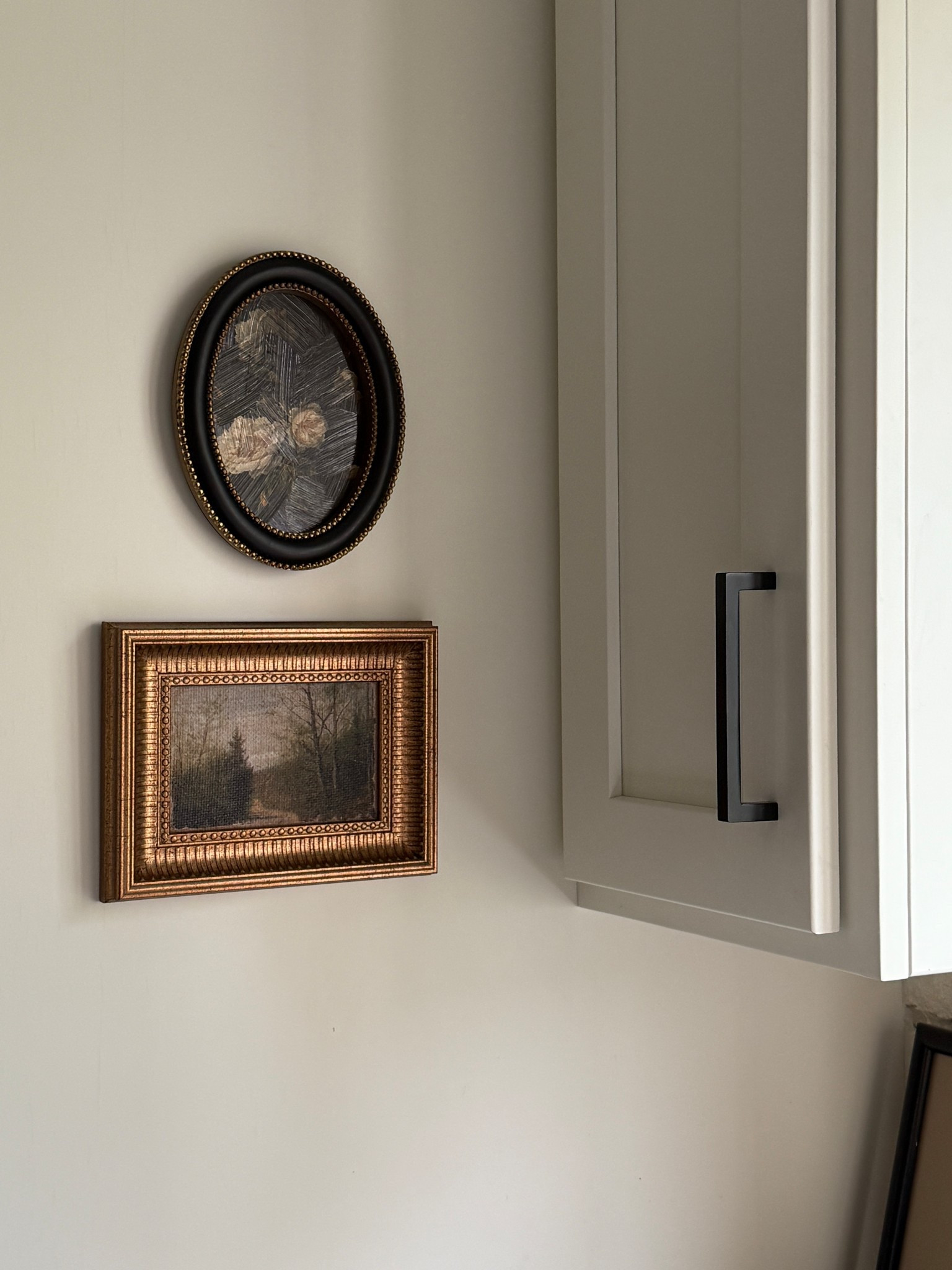 cute pair!! i love the rectangle paired with the oval and i chose to hang it in a unique spot in the kitchen!
