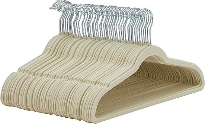 Amazon Basics Slim, Velvet, Non-Slip Suit Clothes Hangers, Ivory/Silver - Pack of 50 | Amazon (US)