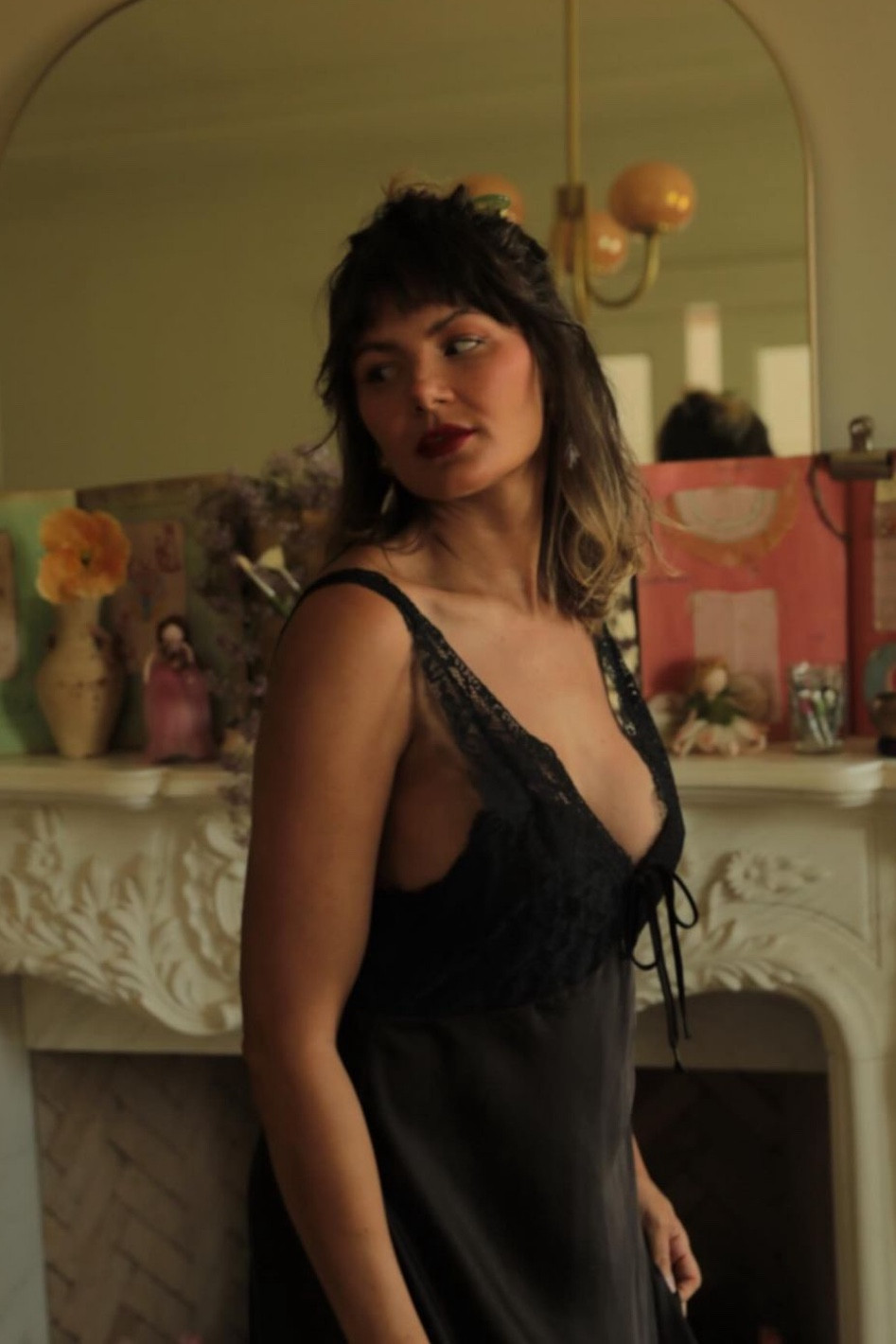 Dress is free people, earrings are brinker and eliza, it looks like she’s wearing the French pin from the dae Stargloss set