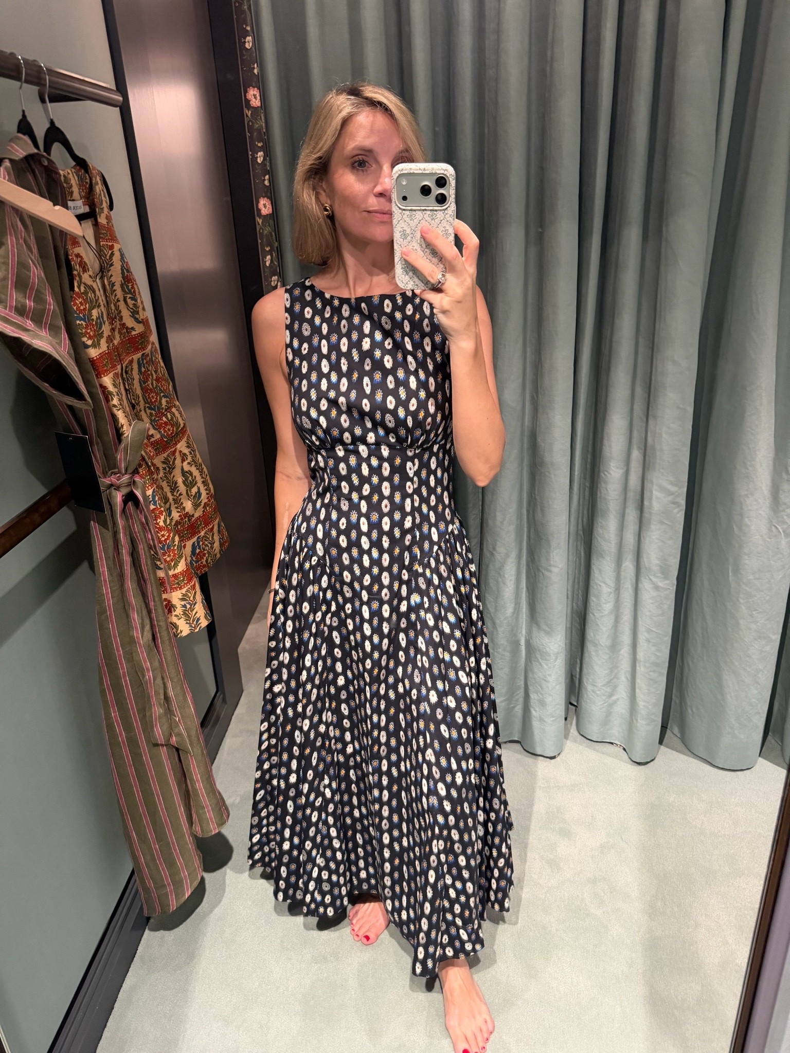 Obsessed with this navy printed dress! It’s so flattering on and a perfect transitional summer to fall piece.

#LTKootd #LTKgrwm #LTKOver40