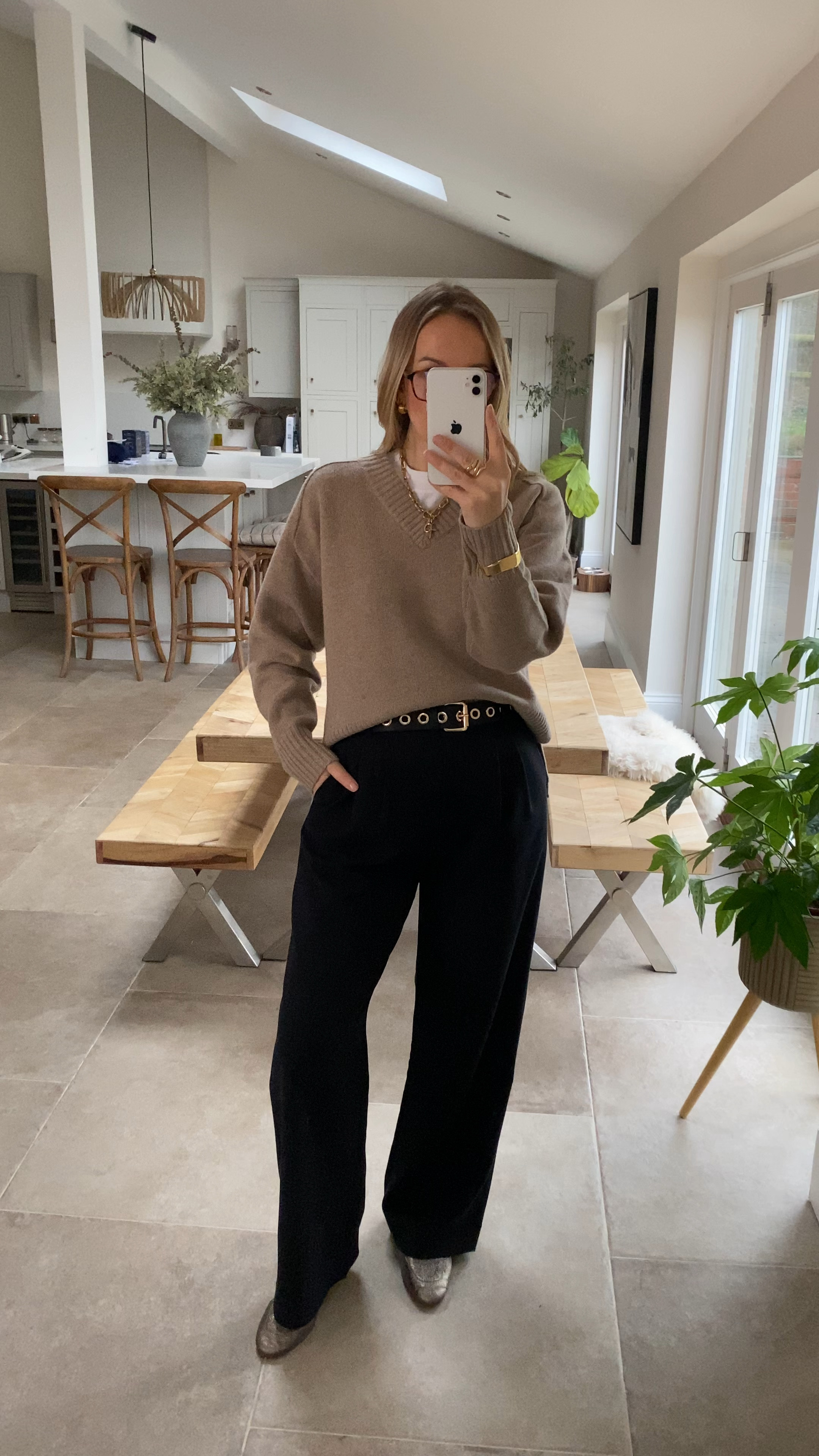 A simple workwear look featuring our favourite pleat front tailored trousers. 
A stylish pleat front wide leg (not too wide) that comes in 3 lengths with belt loops and pockets. I wear the 30 long with flats . 

The knit is beautiful , a 100% soft merino wool in a modern V neck silhouette. Wearing a M/L 

T- shirt wearing a medium 

Loafers are old but I’ve linked some similar options . 

#LTKworkwear #LTKuk #LTKFashionMonth