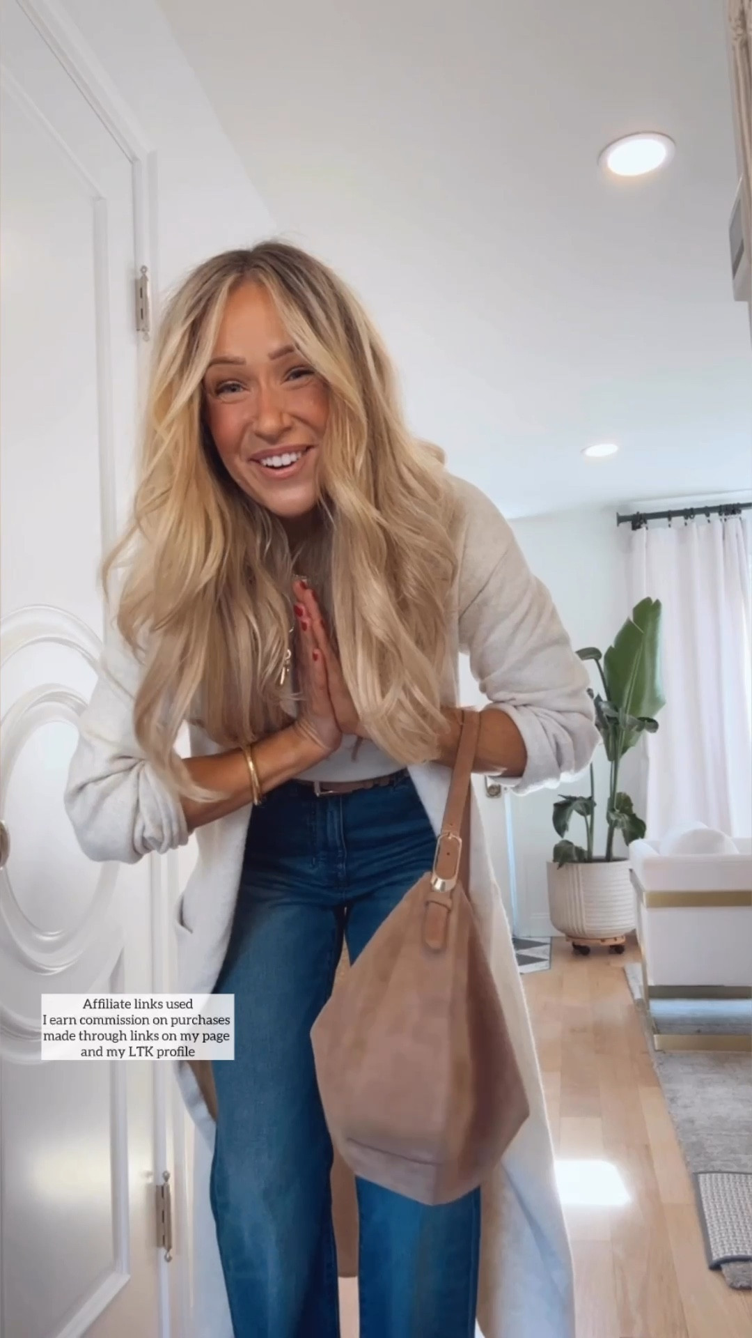 Fall fashion 

Long duster cardigan sweater neutral
Sweater tee short sleeve
Flare jeans 
Suede boots 